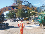 Fonterra emergency response team members help recover a collapsed fertiliser tank in Kaikoura.