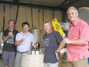 Gisborne Garagiste Wine Company directors Russell Walsh (left), Brent Laidlaw (second from right) and Peter Bristow (right) with wine writer and commentator Raymond Chan.