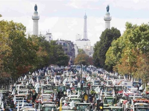 Angry French farmers with their tractors in Paris.