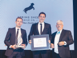 Spring Sheep Milk Co. chief executive Nick Hammond, centre, and chief operating officer Thomas Macdonald accept the Company-X Innovation Award from Waikato Chamber of Commerce chief executive Don Good.
