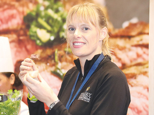 Massey University’s Nicola Schreurs with samples of new generation beef.