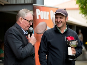 MC Tim Dyer and overall winner Andrew Sidey.