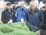 PM Chris Hipkins pictured at the Massey University Fieldays site along with Paul Kenyon and Ray Goer.