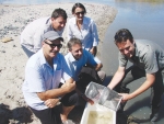 Living Water Open Day at Pukorokoro, Miranda: DoC director general Lou Sanson Geoff Ensor and Kevin Carter of DoC and Paul Grave and Cerasela Stancu of Fonterra.