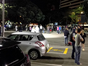 Worried people in Wellington fill a downtown carpark after the quake on early Monday morning. Photo: ‏@nkpnz on Twitter.