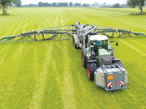 The system acts to treat slurry and digestate with sulphuric acid during application in the paddock.
