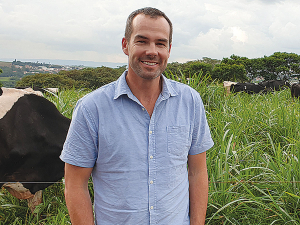 Cam Henderson visiting a dairy farm in Brazil.