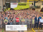 The Claas team celebrate the 50,000th Lexion combine harvester rolling off the production line.
