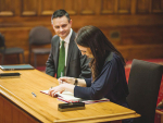 James Shaw and Jacinda Ardern signing the deal.