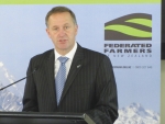 PM John Key claims he does not have political backing to change overseas land ownership rules.