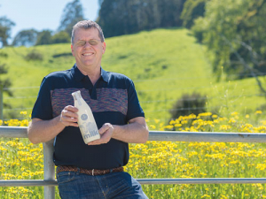 ￼Nelson dairy farmer Julian Raine with the bottled milk.