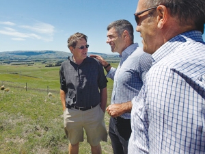 Sharing some smiles while surveying the effect of the North Canterbury drought from the top of Red Oaks Station are Weka Pass Station owner Richard Murchison, left,  Minister for Primary Industries Nathan Guy and Local MP for Kaikoura Stuart Smith.