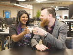 LIC AgCelerator Fund manager Eleshea D&#039;Souza toasts to a new investment partnership with CEO David McDonald from TrackBack with a cold glass of milk.