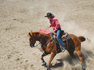 Charlotte Montgomery barrel racing.