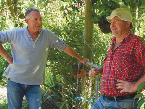 Parting ways: Kaikoura farmers Grant Wareham (left) and Graham Collins pictured a few weeks after the earthquake. Wareham has sold his farm to Collins.
