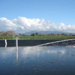 Effluent pond with stirrer