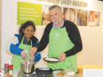 Craig Prichard demonstrating sheep cheese at an earlier conference.