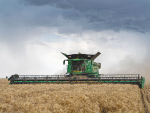 John Deere claims that automating the headland turns makes operating the harvester easier and more precise.