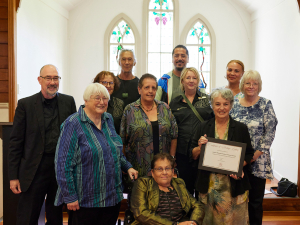 Members of the The Waitakere Arts and Cultural Development Trust Board, Corban descendants and Heritage New Zealand Pouhere Taonga staff at the function celebrating the listing of the historic complex. 