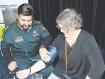 New RCNZ president Helen Slattery has her pulse taken at the organisation's recent annual conference.