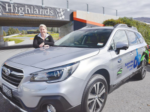 Federated Farmers’ Southland territory manager Laura Sanford with her Subaru.