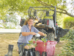 Under the watchful eye of Jack, Sophia Hunt prepares oak seedlings for planting on the farm that&#039;s been in her family for more than 100 years.