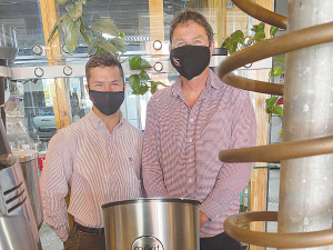 Josh Williams, Fonterra Brands NZ business development manager (left) and Eric Heycoop, Emporio Coffee Owner.