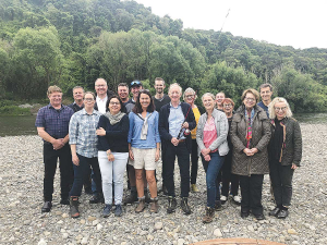 EU ambassadors and Wairarapa farmers enjoy drinks at Ruamahanga River on the Williams&#039; farm.