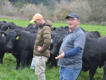 Mark Stokman (right) and his son Jake speaking at the field day on their farm.