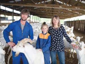 Wiebe and Piety Smitstra and their daughter with the goats.