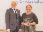 Trish Rankin after receiving her award from Fonterra’s Mark Cronin.