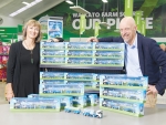 Matt Shirtcliffe, creative director Shirtcliffe & Co (right) and Michelle Thompson, chief executive RHANZ, with the mini tankers at the Fonterra Farm Source Store in Cambridge.