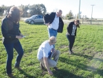 International expert on disease resistance in hoticultural and arable crops Dr Andreas Mehl (centre) inspects a crop at Lincoln.