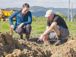 Dr Lydia Cranston and Associate Professor Dave Horne examine the pipes. Ryan Willoughby, Massey University.