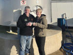 Federated Farmers president Colin Hurst and his wife Janis toast the first milk pick up from their new farm.
