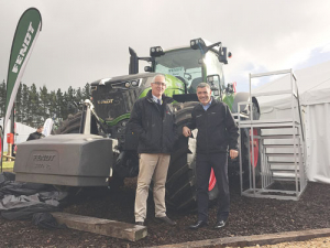 AGCO NZ national sales manager Peter Scott and Primary Industries Minister Nathan Guy launch the new Fendt 1000 at Fieldays. 