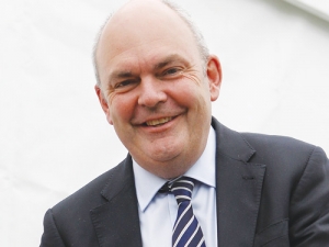 Science and Innovation Minister Steven Joyce tastes mozzarella cheese pizza at the Clandeboye plant.