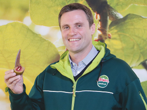 Zespri chief executive Dan Mathieson with a red kiwifruit.