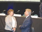 New Fonterra director Alison Watters (left) chats with fellow director Bruce Hassall at the co-op&#039;s annual meeting in Rotorua earlier this month.