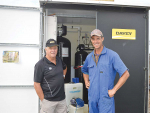 Tatuanui farmer Johan van Ras (right) with his father Richard on their farm.