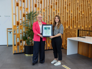 Cady Burns (right) was presented with the Waikato Regional Council Prize in Water Science for 2024 by Council chair Pamela Storey (left) at a full council meeting last week.