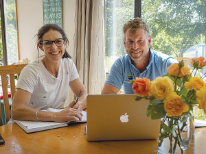 Penny and Gary Robinson review data from their subsurface drip irrigation trial.