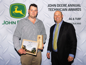 John Deere Service Apprentice of the Year Logan Robertson of Southern Farm Machinery with JD ANZ managing director Luke Chandler.