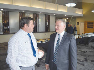 Fonterra chairman Peter McBride with Whakatane farmer Gerard van Beek at the co-op&#039;s annual meeting in November.