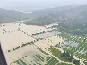 Last week’s flooding led to slips in upper South Island blocking access to 70 dairy farms, forcing farmers to dump milk. Photo credit: Nelson Marlborough Rescue Helicopter Trust