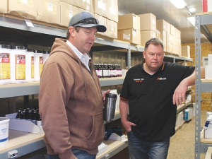 Californian dairy farmer EJ Ruan shows Kiwi farmer Blair Murdoch his new medicine storage facility with fingerprint security.