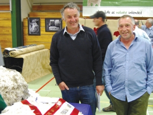 Golden Fleece winner Martin Murray (left) with blade shearer Steve Bool who clipped the winning fleece.