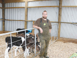 Manawatu farm manager Paul Mercer is keeping detailed records of new-born calves using both modern and traditional methods.