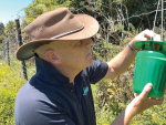 FAR biosecurity spokesman Ivan Lawrie with a fall armyworm pheromone trap.