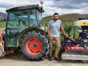 Simon Gourley with a seeder used to sow cover crops.